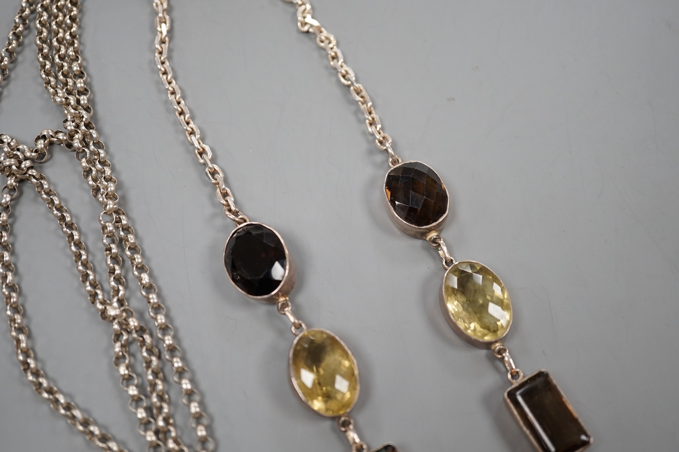 A large continental 925 white metal and multi-gem set rectangular pendant necklace, overall 72cm and a white metal double strand chain hung with a silver vesta case.